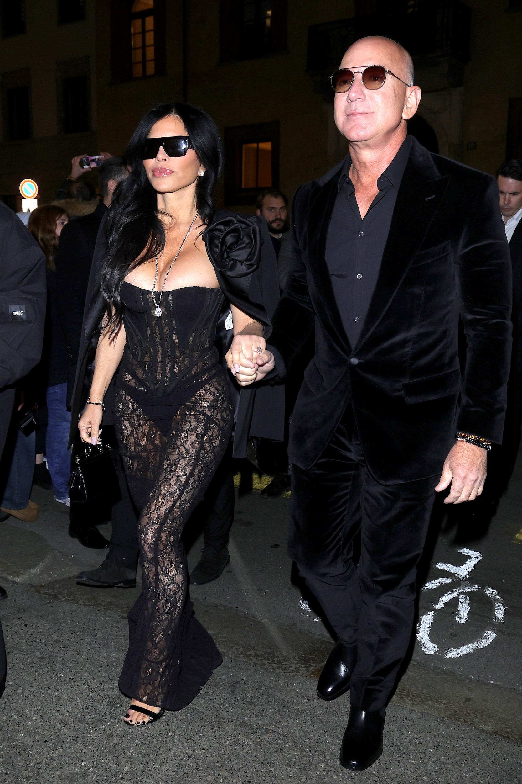 Lauren Sánchez and Jeff Bezos attend a 2024 Dolce & Gabbana party.