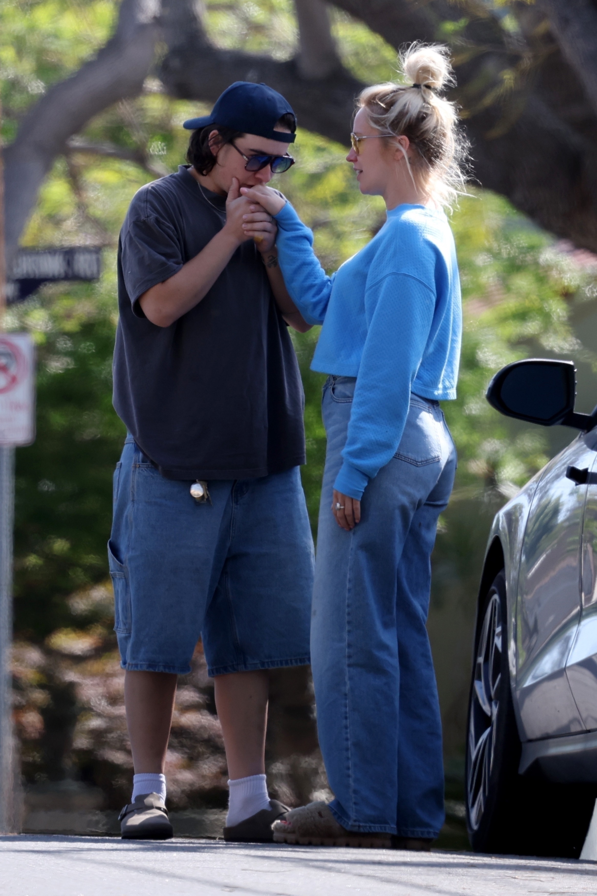 Jade Whipkey kisses Anna Camp's hand. 