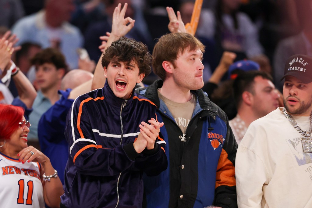 Timothée Chalamet cheers in the first quarter of Game Six of the Eastern Conference Second Round NBA Playoffs between the New York Knicks and the Boston Celtics at Madison Square Garden