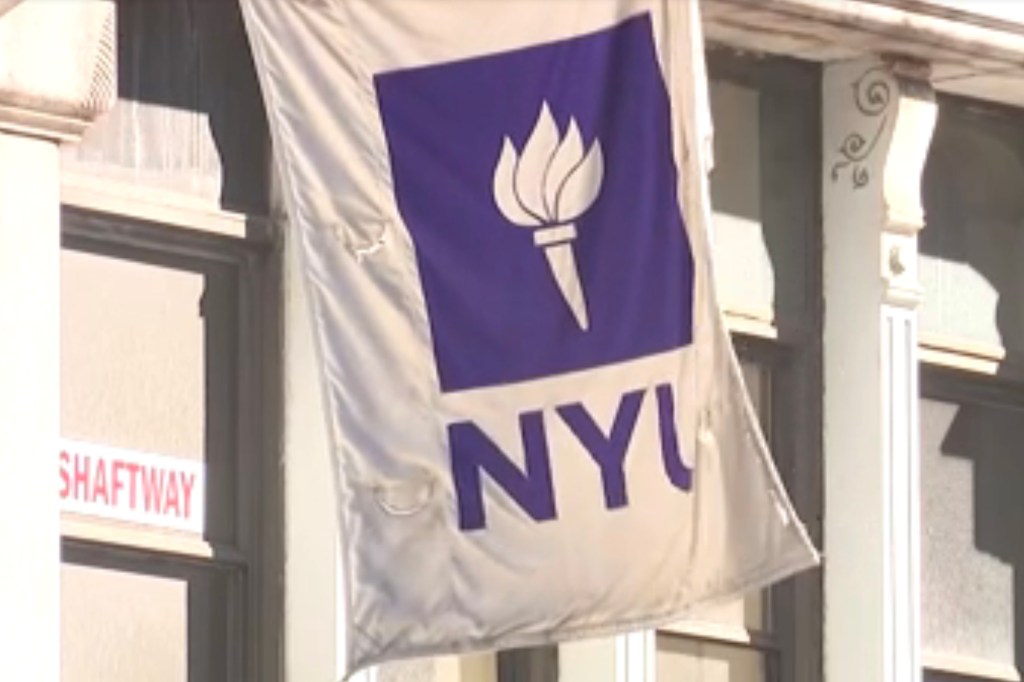 An NYU flag flies on the NYC campus.