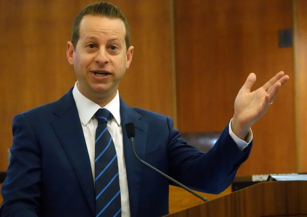 US Rep. Jared Moskowitz speaks after being sworn in during a ceremony in the Broward County Commission chambers in Fort Lauderdale on Jan. 27, 2025.