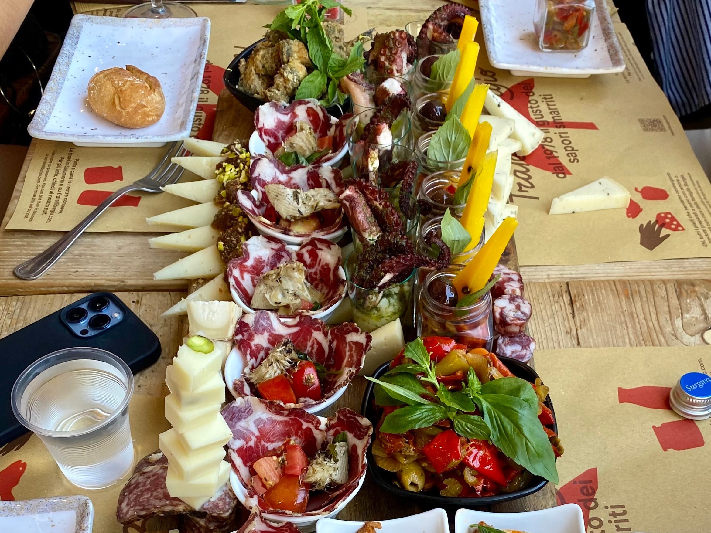 Sicilian pizza, meats, cheeses on large tray