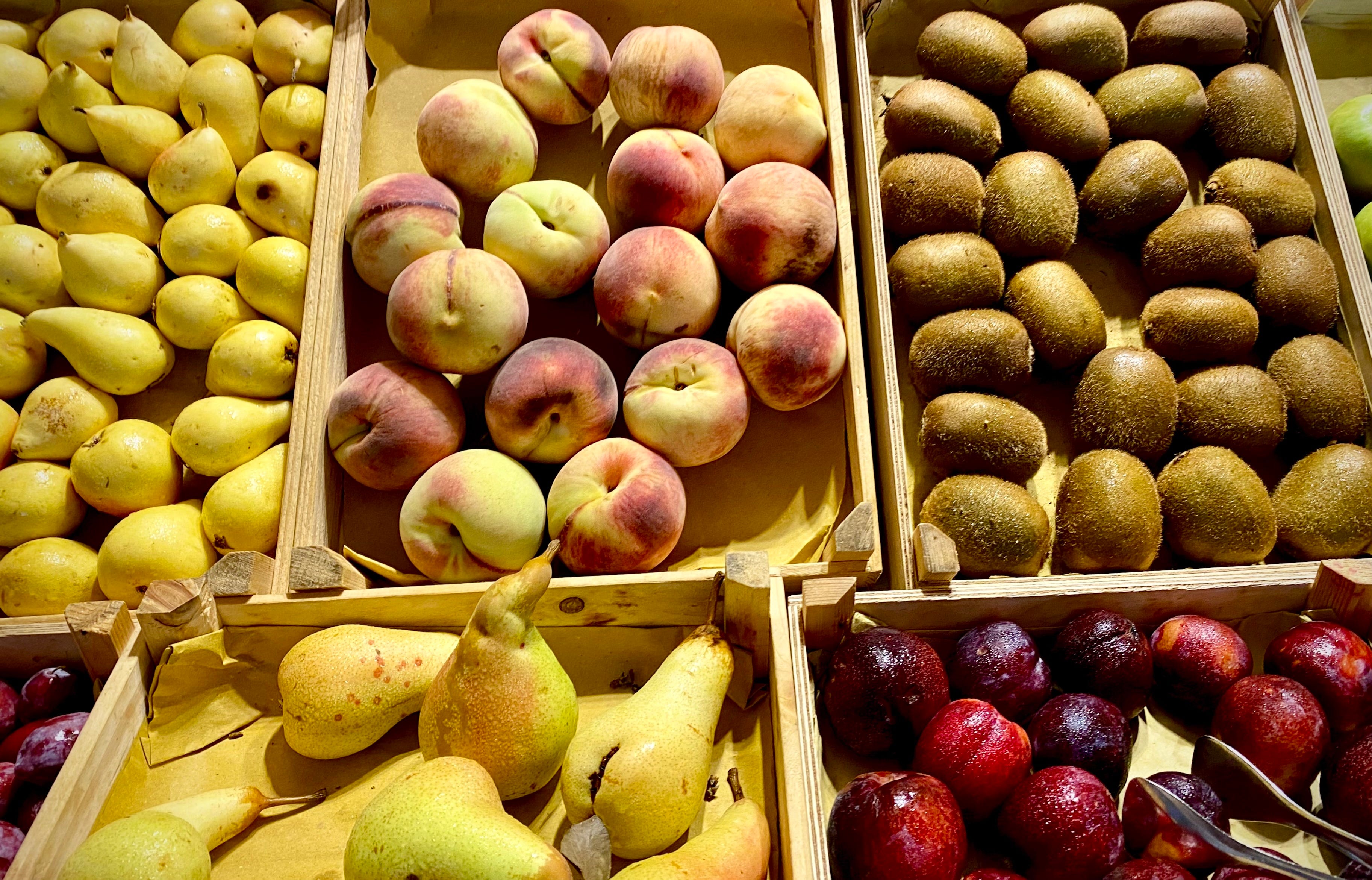 Fruit in bins at stand in Sicily