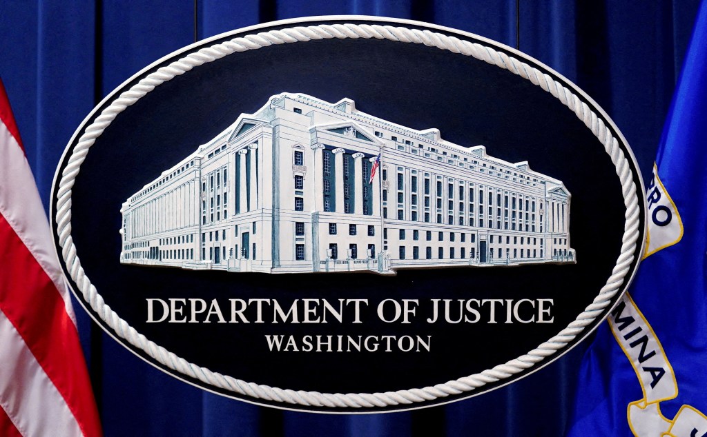 A U.S. Justice Department logo or seal showing Justice Department headquarters.