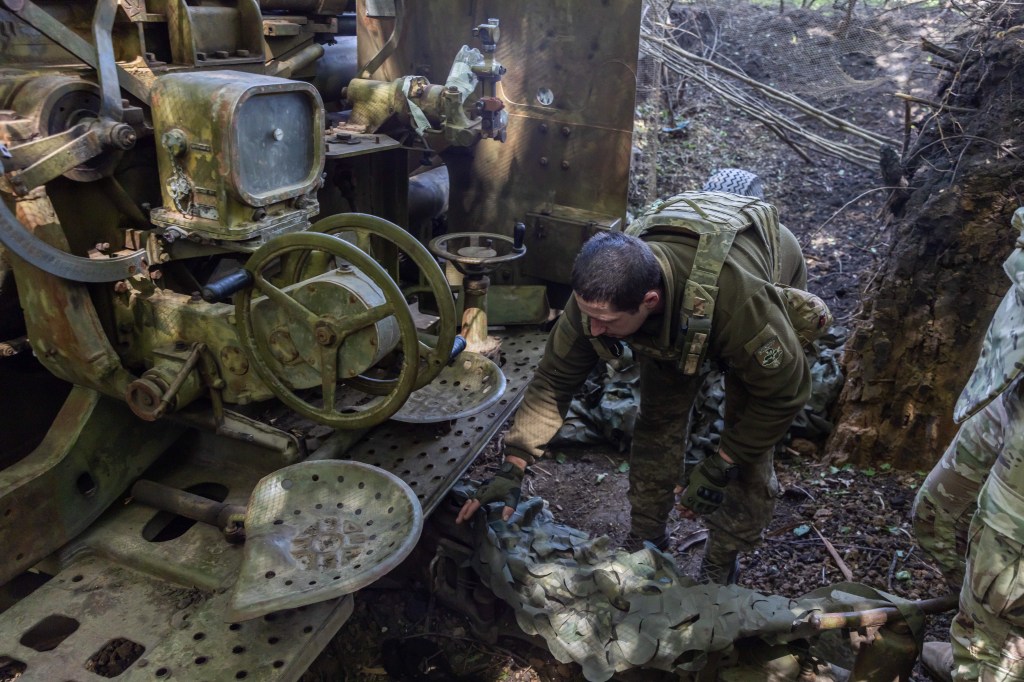 Ukrainian servicemen of the 127th Territorial Defence Brigade firing a KS-19 100mm gun towards Russian positions near Kharkiv, Ukraine on 16 May 2025.