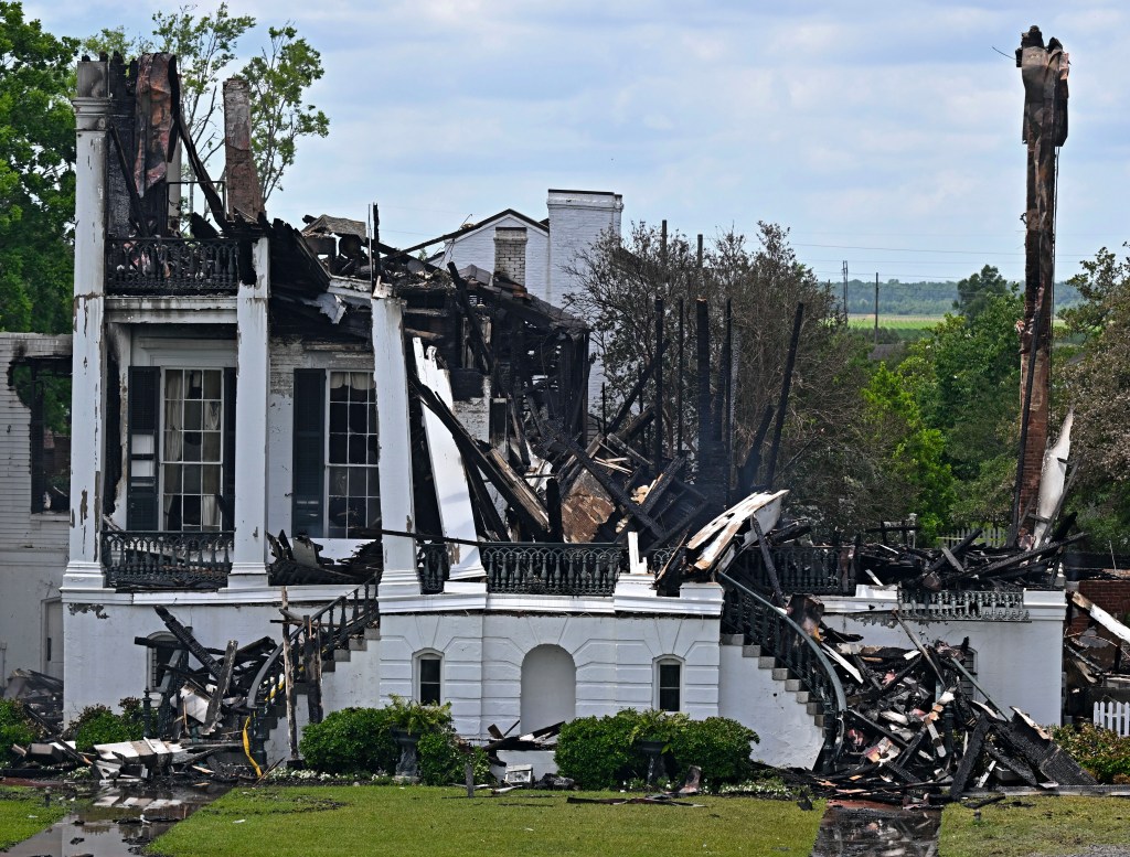 Firefighters at the scene of the historic Nottoway Plantation fire in White Castle, La, on May 16, 2025