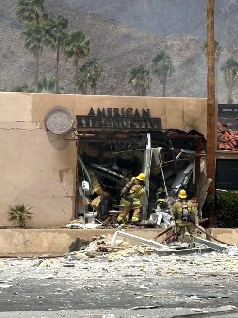Firefighters at the scene of the explosion.