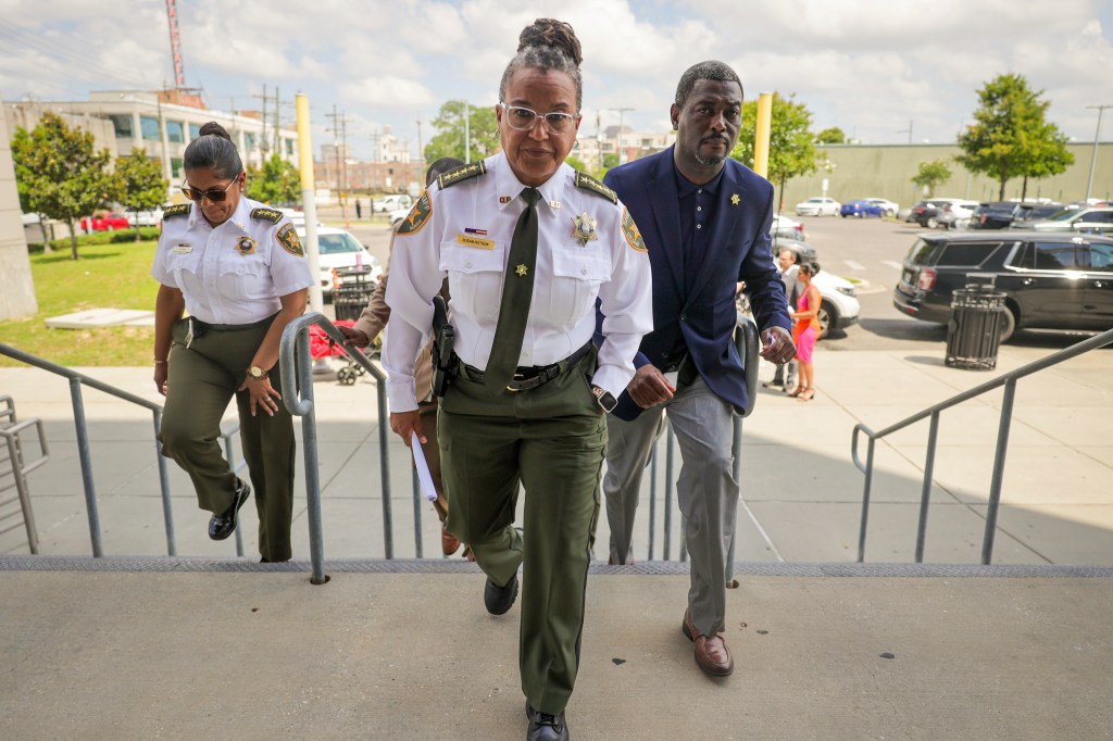 Orleans Parish Sheriff Susan Hutson and other law enforcement officials leave a news conference giving an update on the escaped inmates on May 16, 2025.