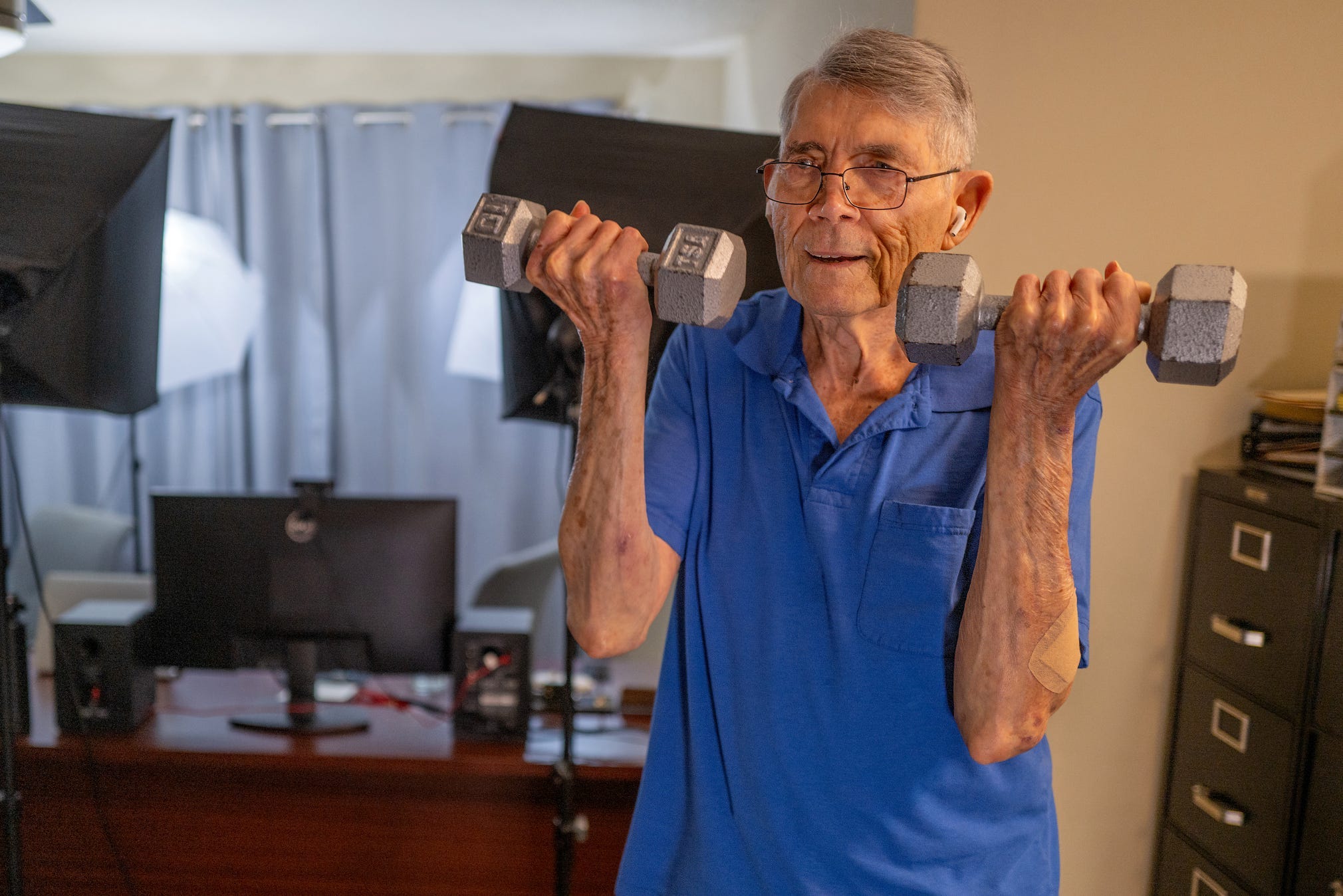 Buddy Hooper lifting weights