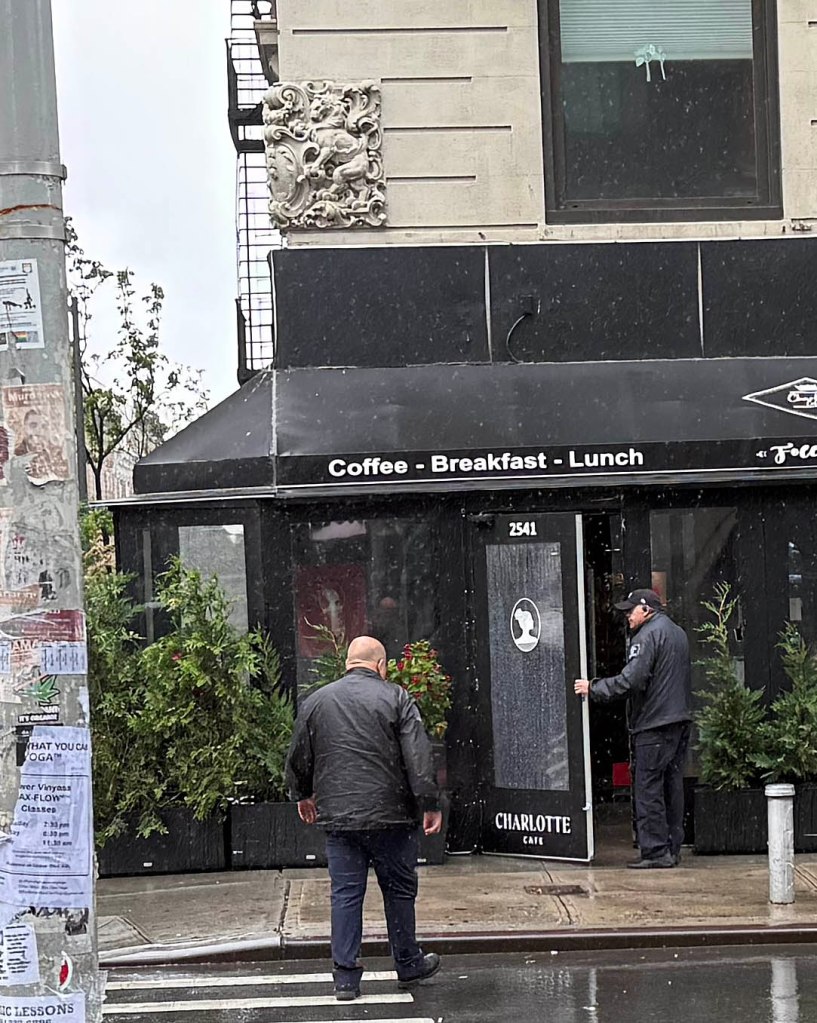 guards entering a cafe. 