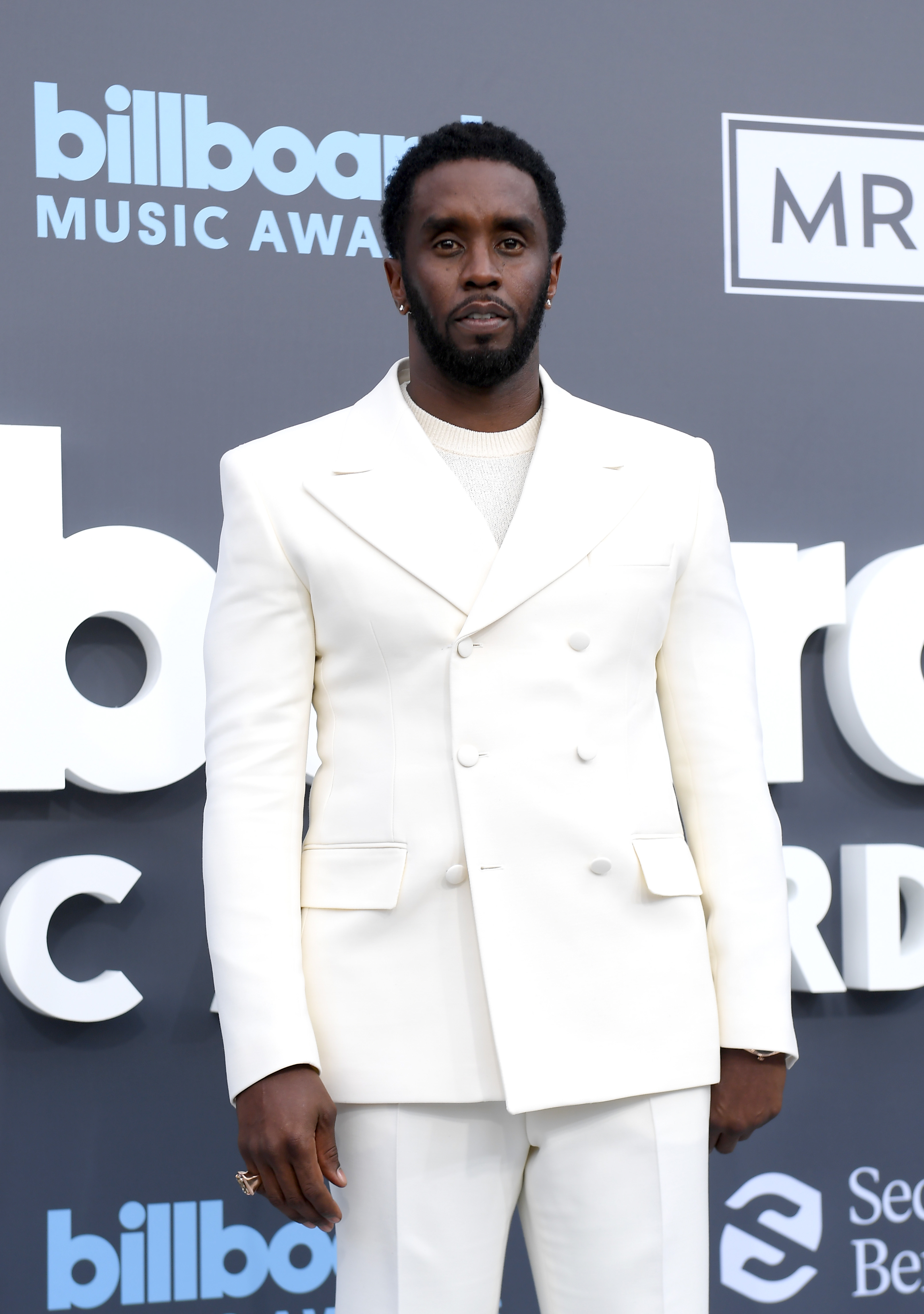 Sean Combs in a white suit in 2022