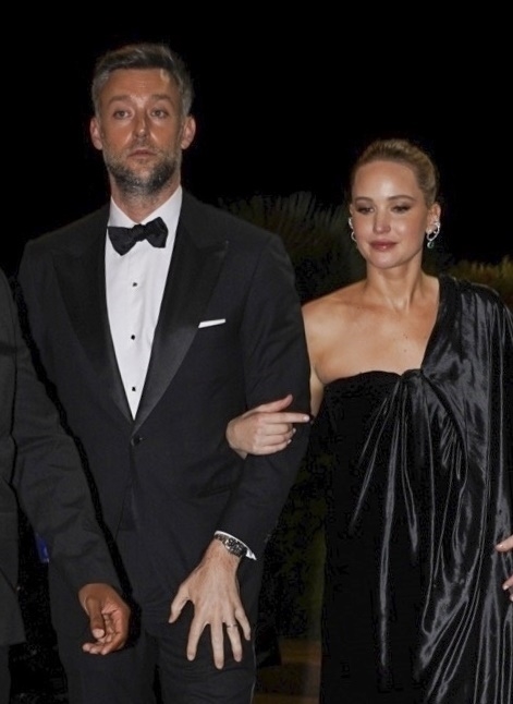 Jennifer Lawrence and Cooke Maroney heading to the Dior after-party during the Cannes Film Festival in 2025