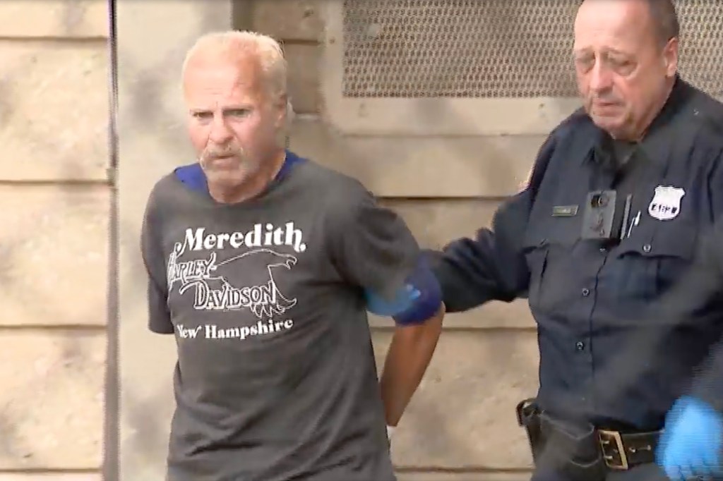 Michael Marron handcuffed by police