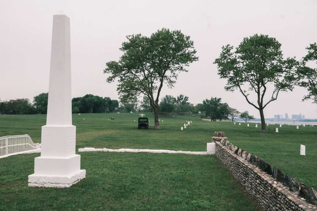 A tour group visiting Hart Island, a mass gravesite and public burial ground off the coast of the Bronx, New York on May 13, 2025.