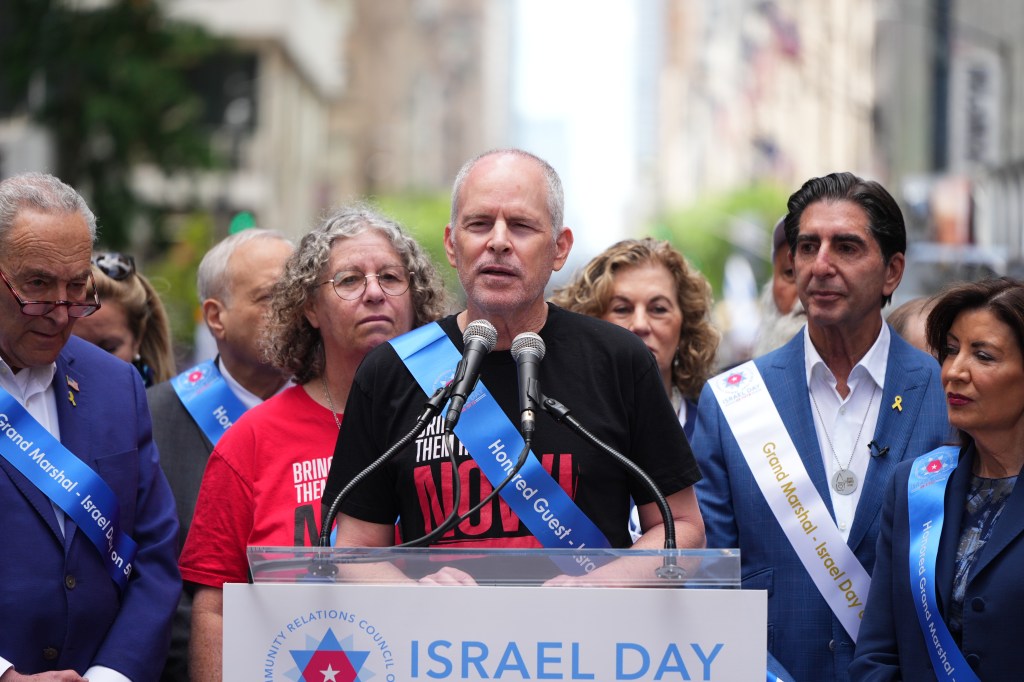 Freed Israeli-American Keith Siegel called for the remaining 58 hostages in Gaza to be freed during the annual Israel Day parade on Fifth Avenue.
