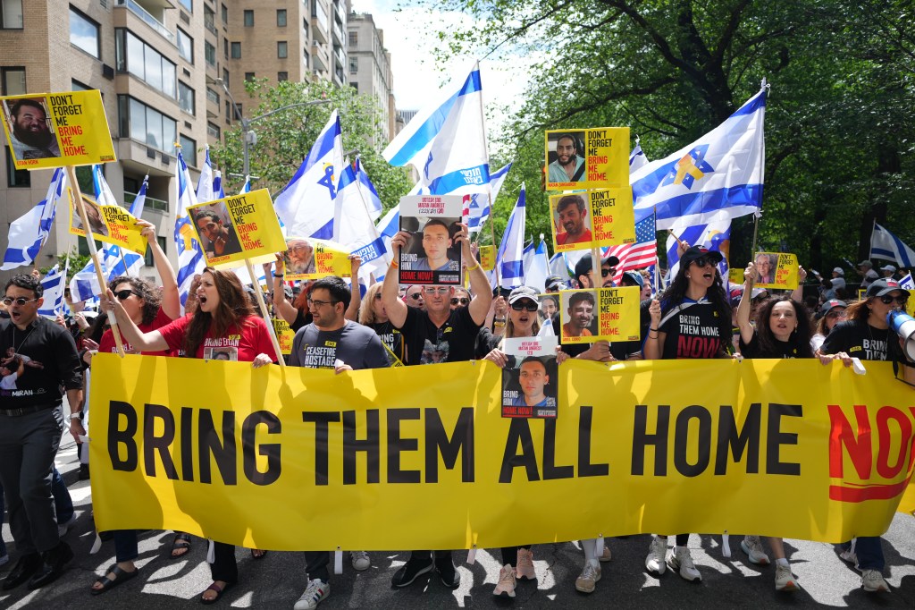 The attendees called on the hostages, less than half of whom are believed to be alive, to be released.