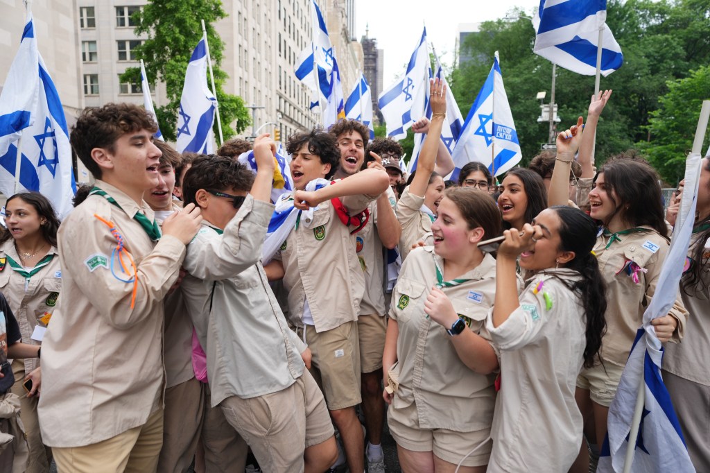 Kids play as they celebrate the annual Israel Day parade.
