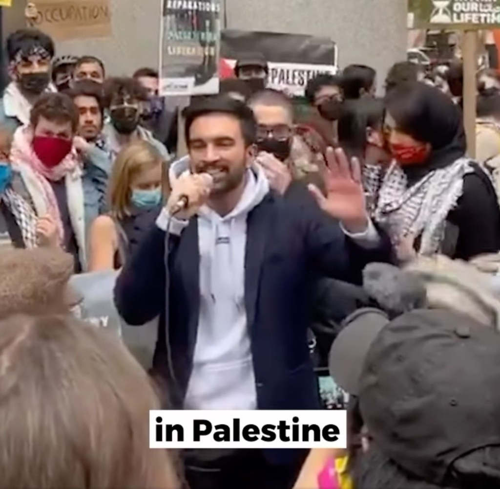 Zohran Mamdani leading a chant at an anti-Israel demonstration outside the Israeli Consulate in New York, May 11, 2021