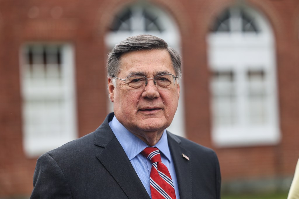 Brookhaven Town Supervisor Ed Romaine speaking at an event in Shoreham, New York about modernizing the sewer system