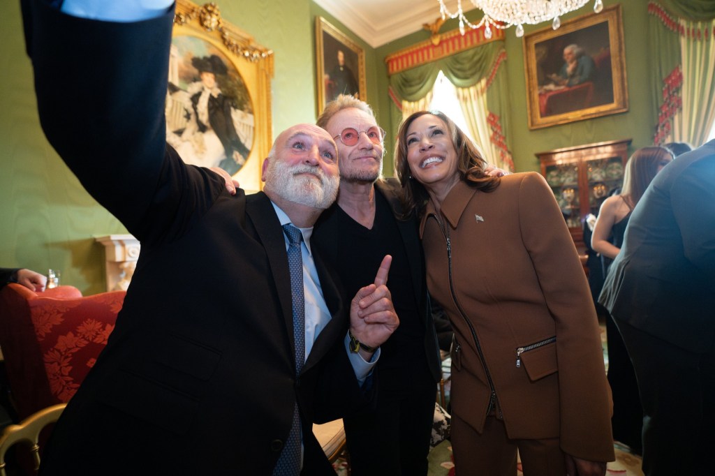 Bono poses for a photo with Kamala Harris during a ceremony at the White House on Jan. 4, 2025.