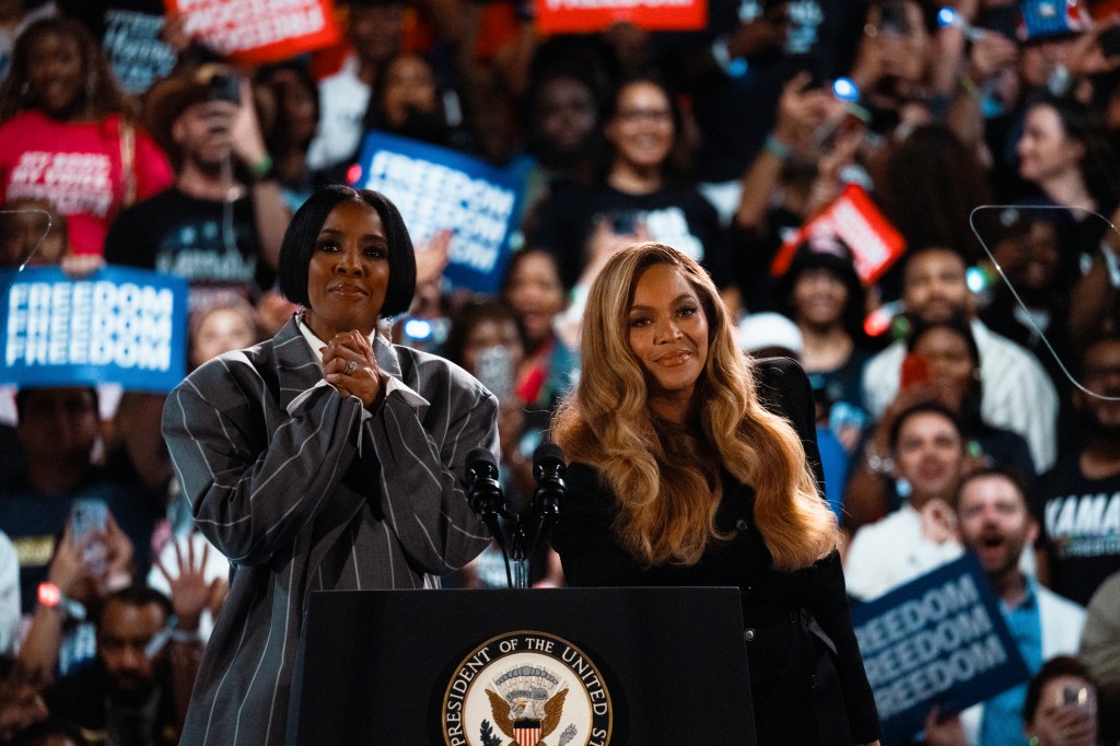 Singers Kelly Rowland and Beyoncé address the crowd at the Houston rally on Oct. 25, 2024. 