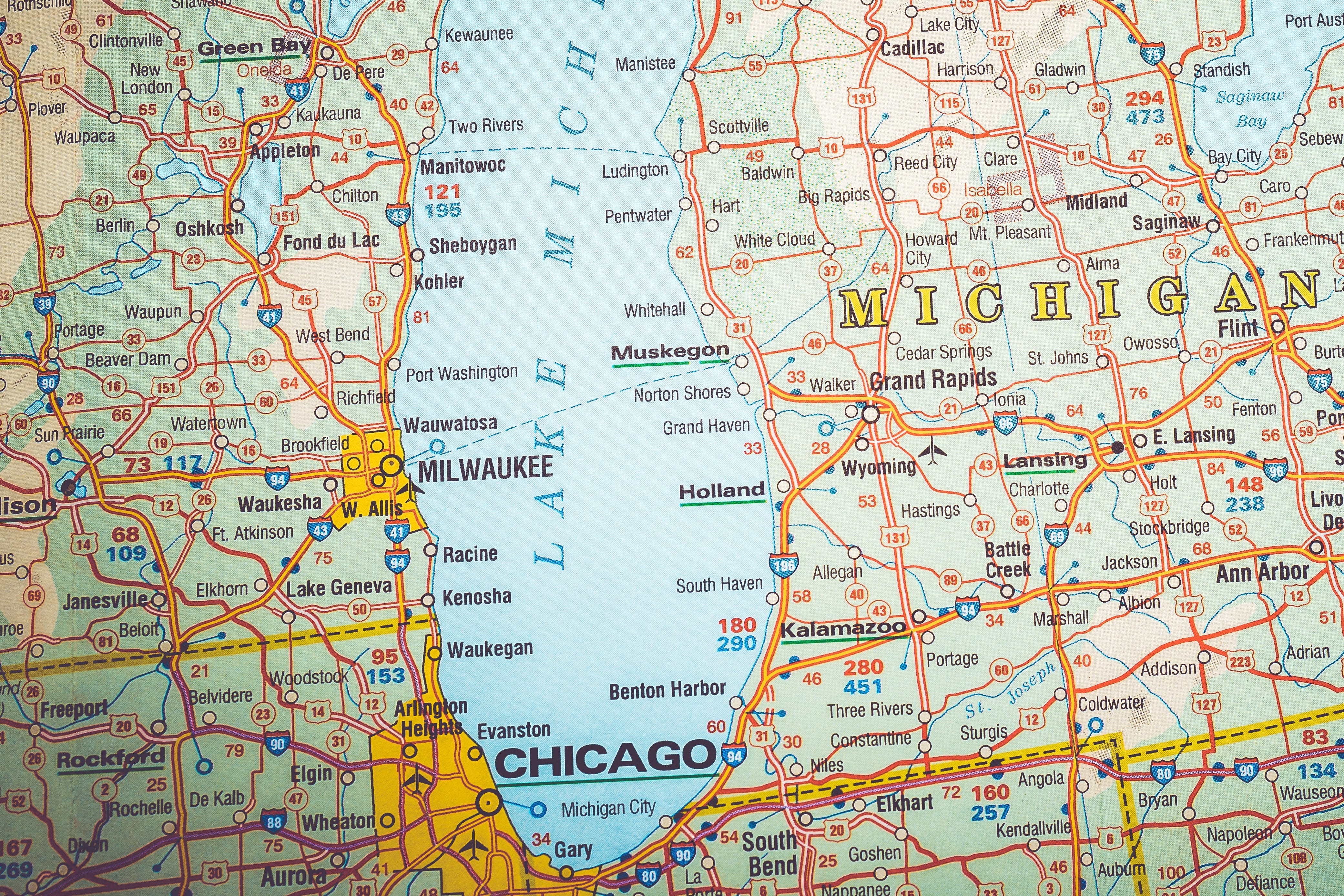 A map showing the Lake Express ferry's route between Milwaukee and Muskegon via a dotted line.