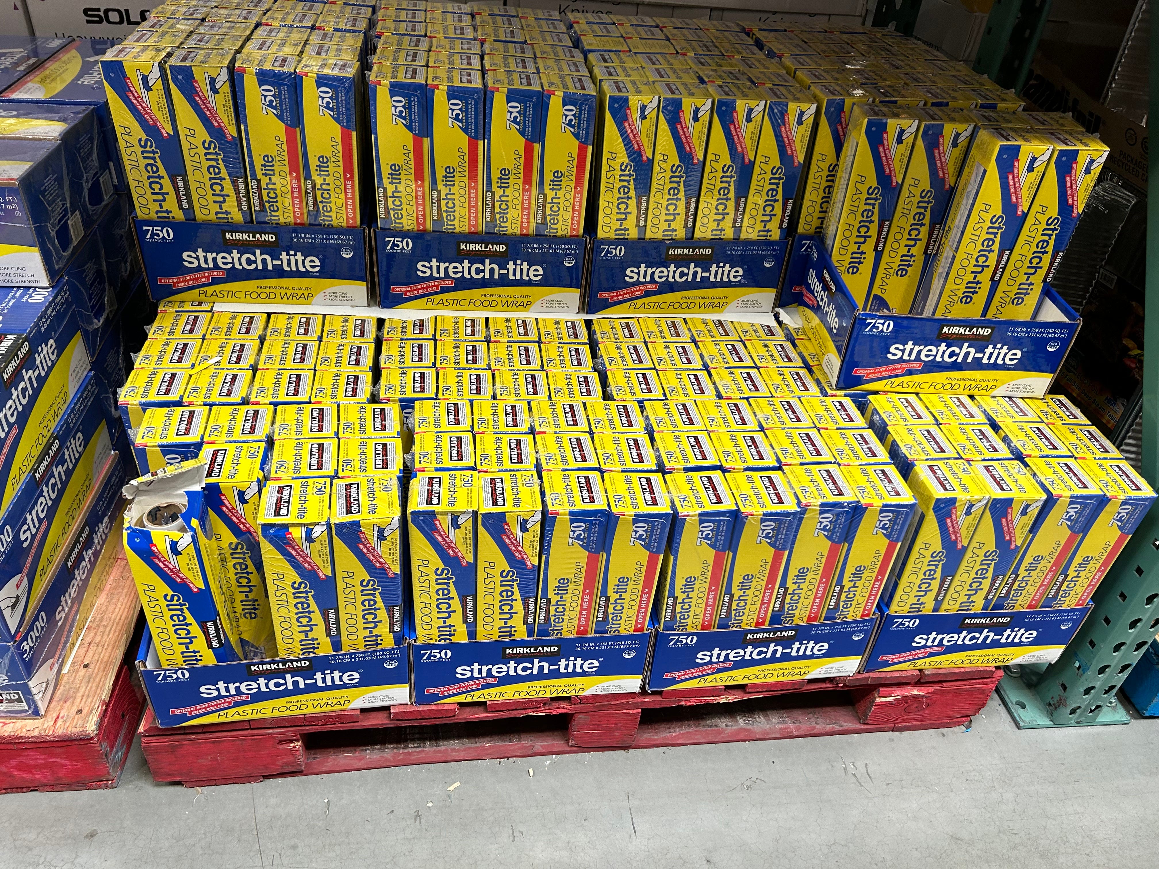 kirkland plastic wrap in yellow boxes on display at costco