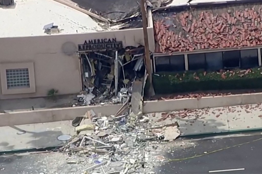 Debris is spilled onto the street after what the Mayor described as a bomb exploded near a reproductive health facility in Palm Springs, California, U.S. May 17, 2025