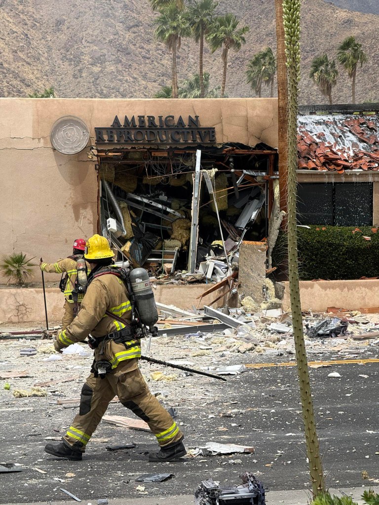 Firefighters in front of American Reproductive Centers.