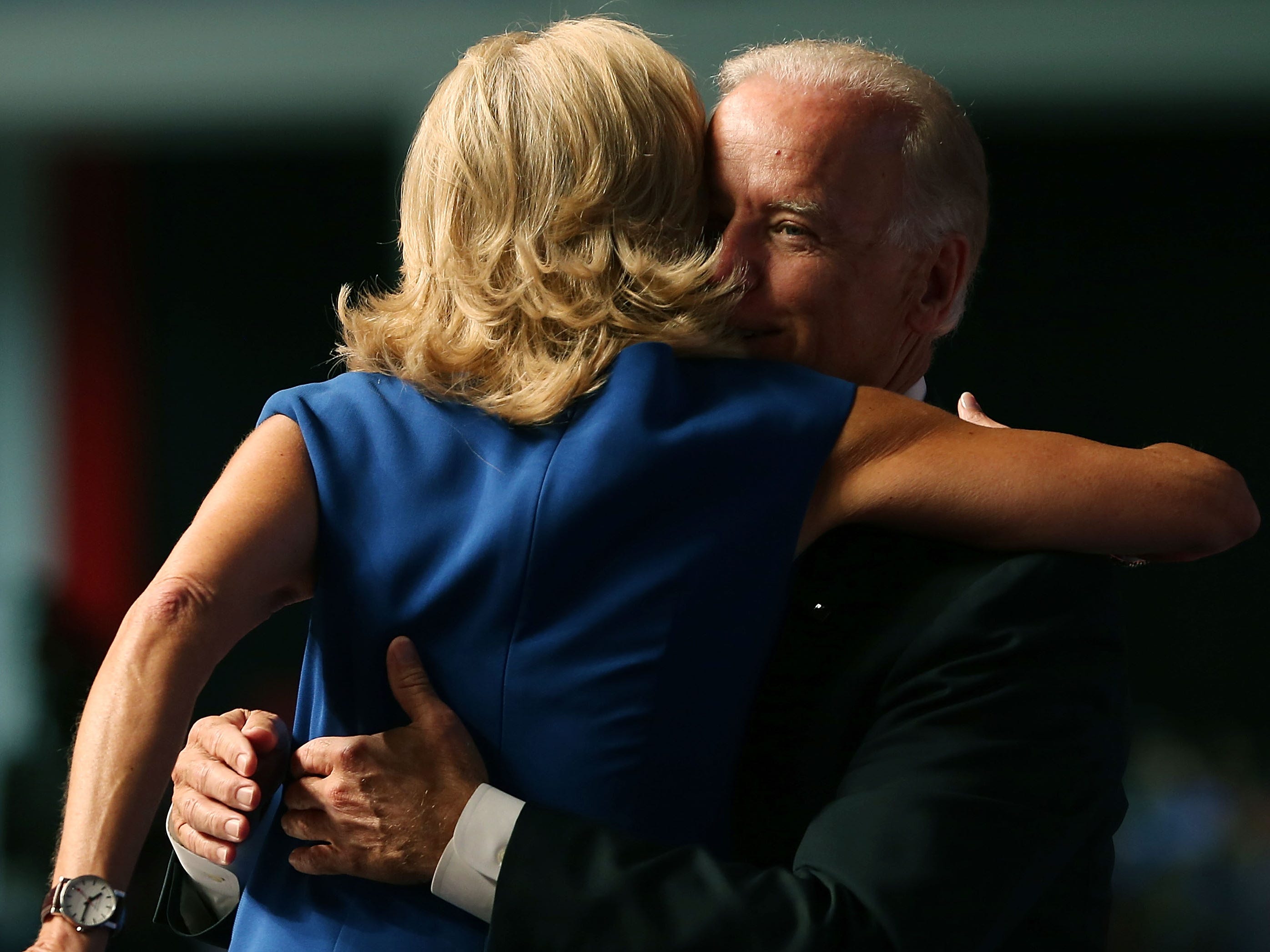 Joe Biden and Jill Biden hug on the campaign trail.