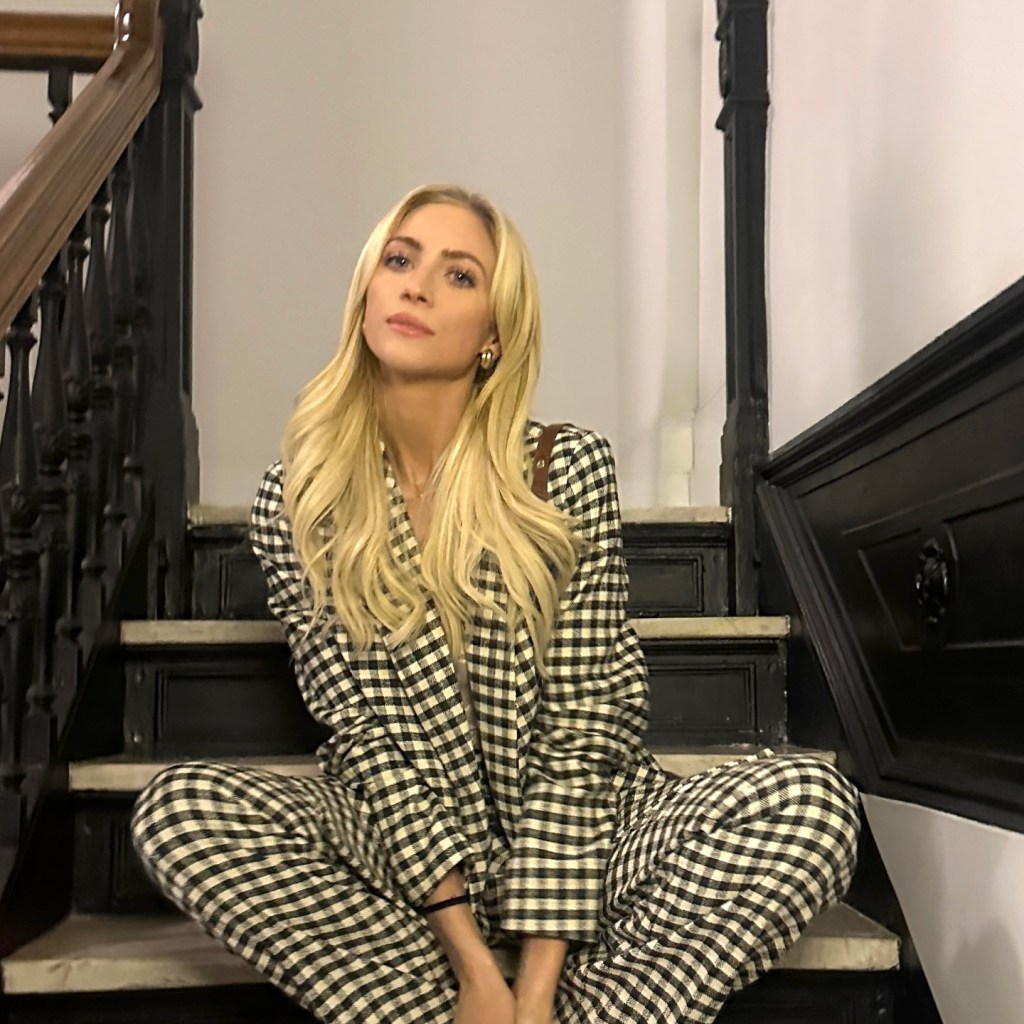 Brittany Snow poses for a photo.