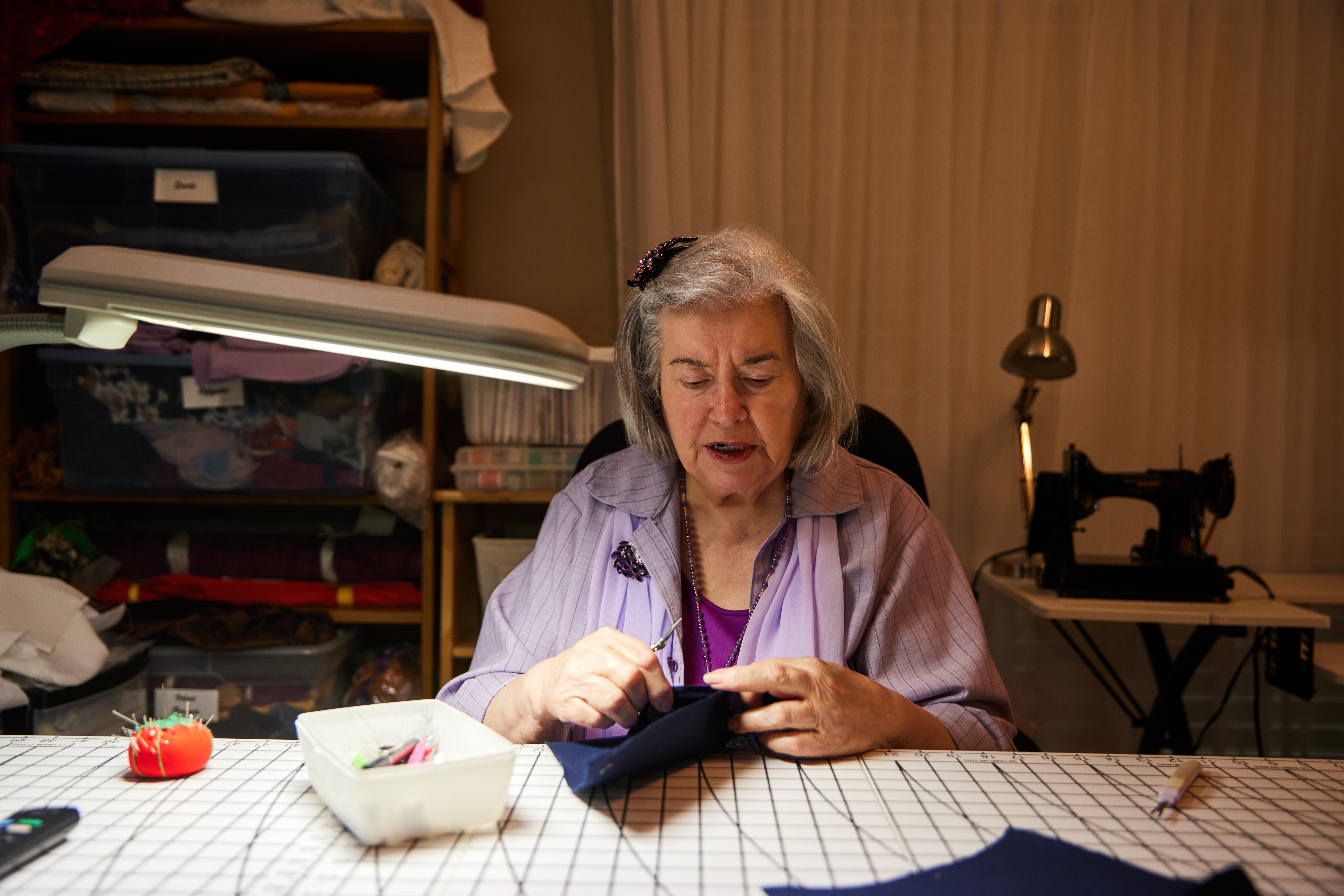 Bernita at her table sewing