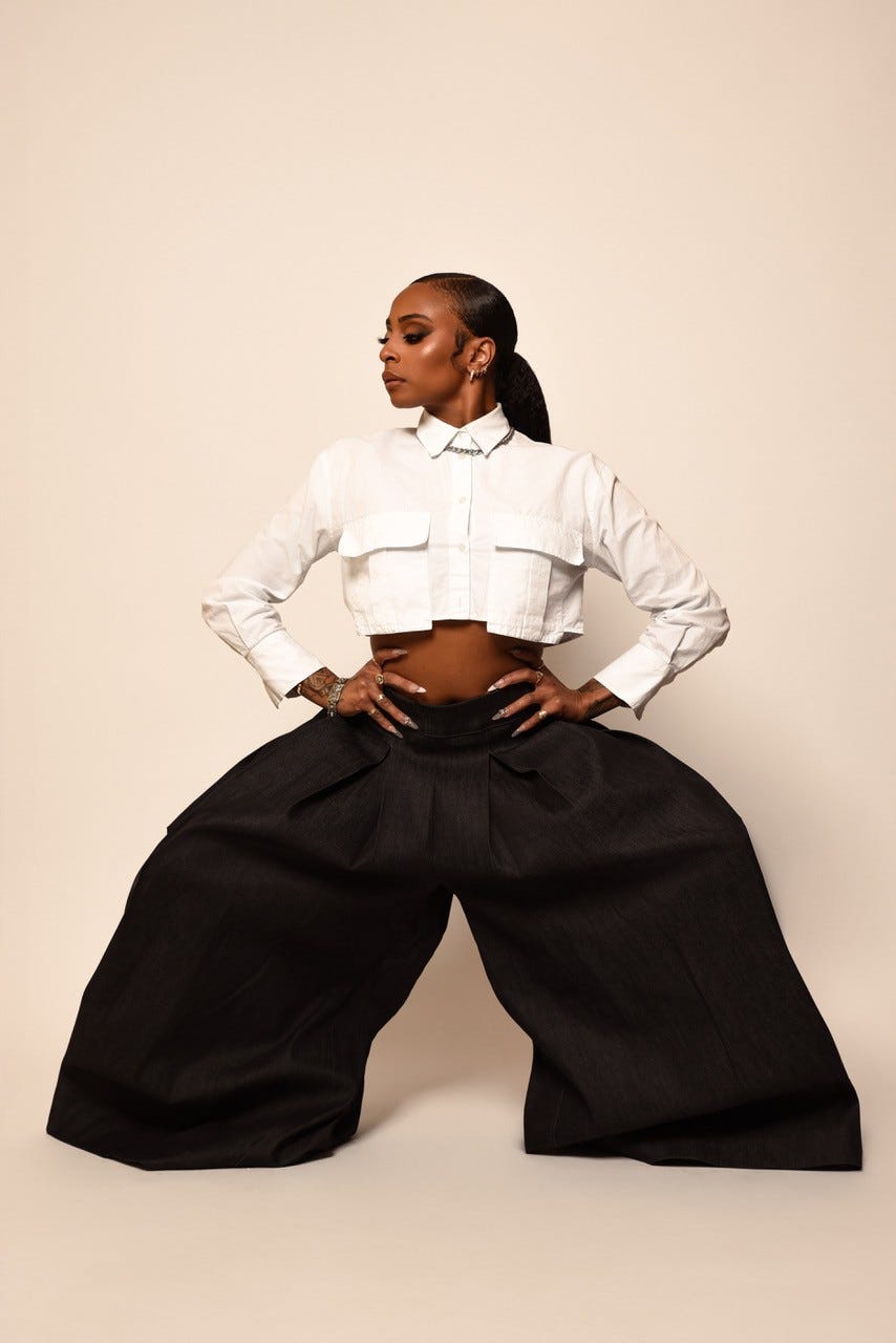 A woman wearing very baggy pants.