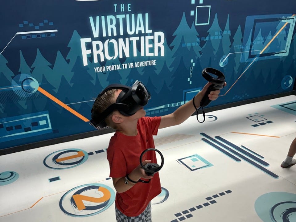 Kid playing virtual reality game