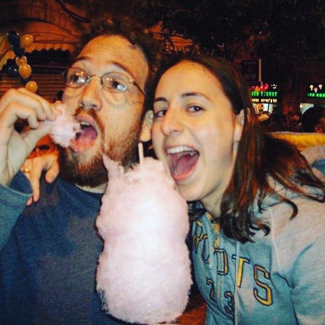 Couple eating cotton candy