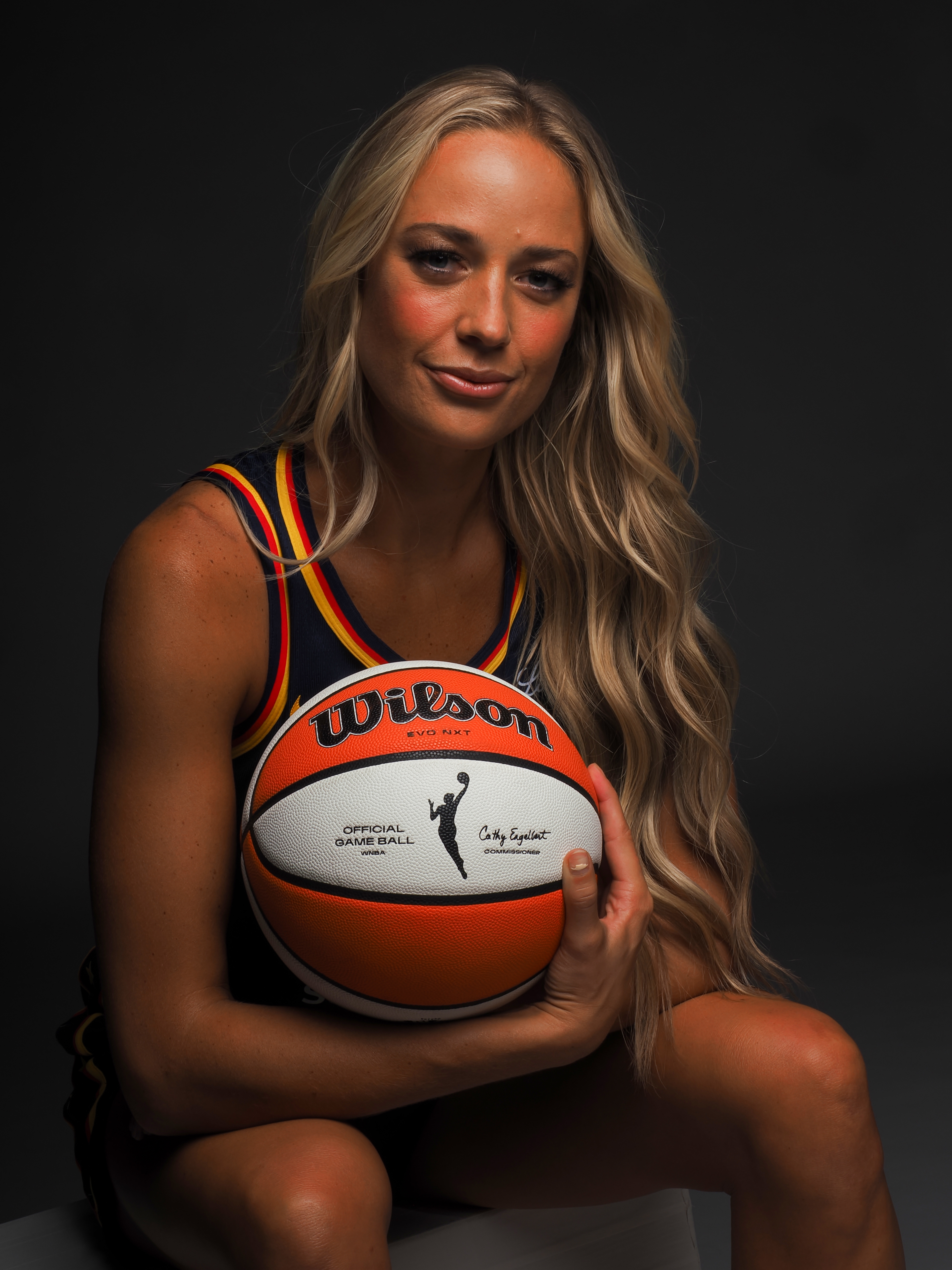 Sophie Cunningham holding a basketball