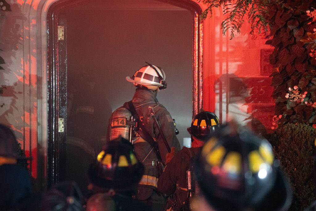 Firefighters battling a blaze in a mansion under renovation in the Kalorama neighborhood of Washington D.C., near former President Barrack Obama's house, on May 19, 2025.