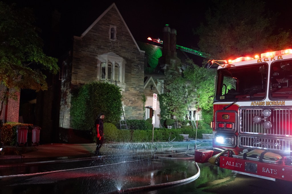 A firetruck at the scene of the fire a the $8.5 million mansion.
