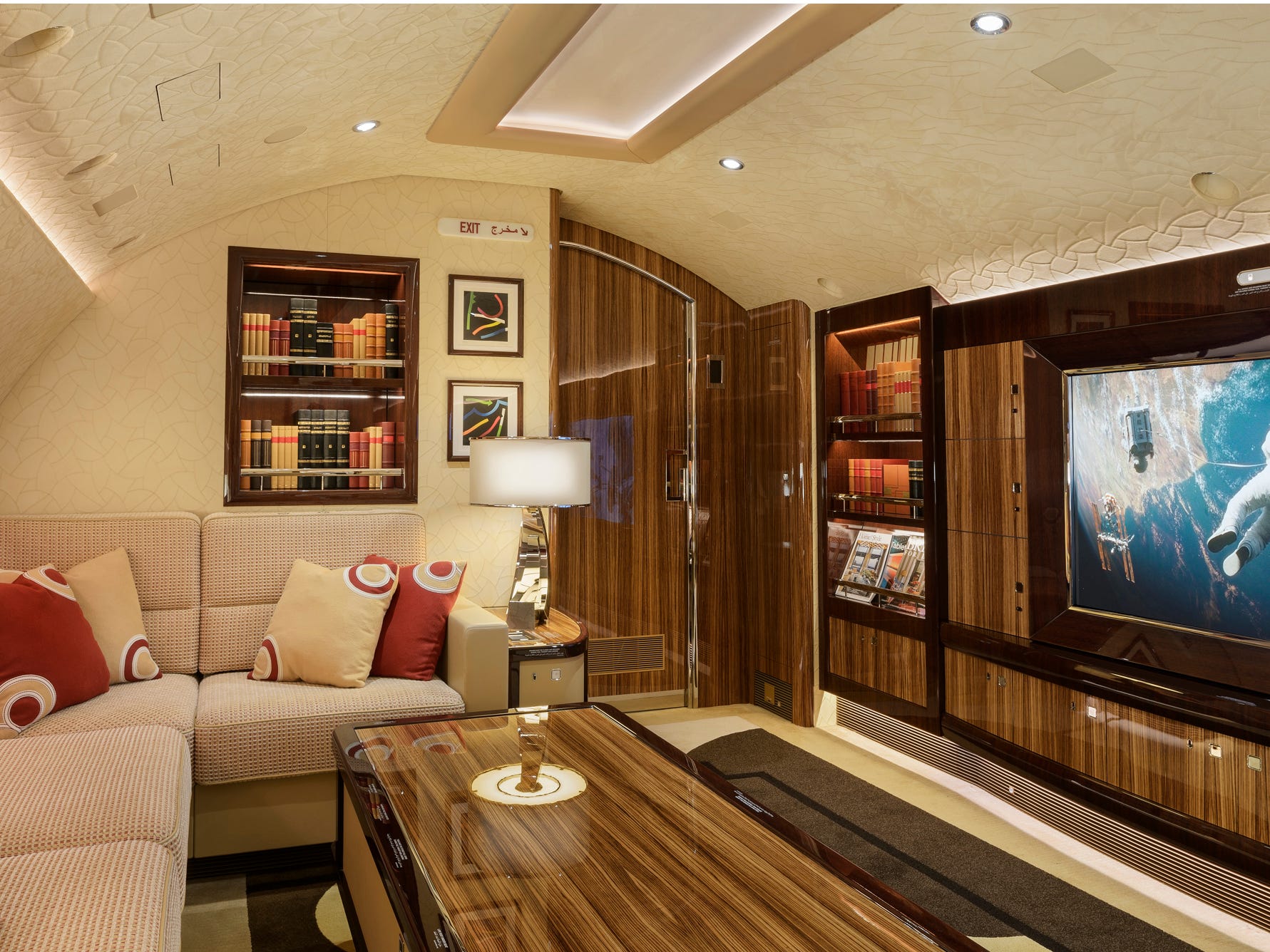 living room with shelves and TV on a BOEING 747-8i BBJ