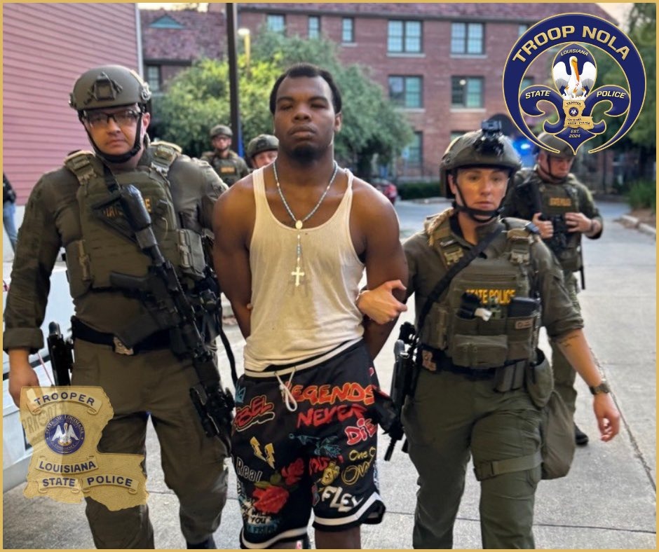 Corey Boyd is escorted by police after he was arrested on May 20, 2025.