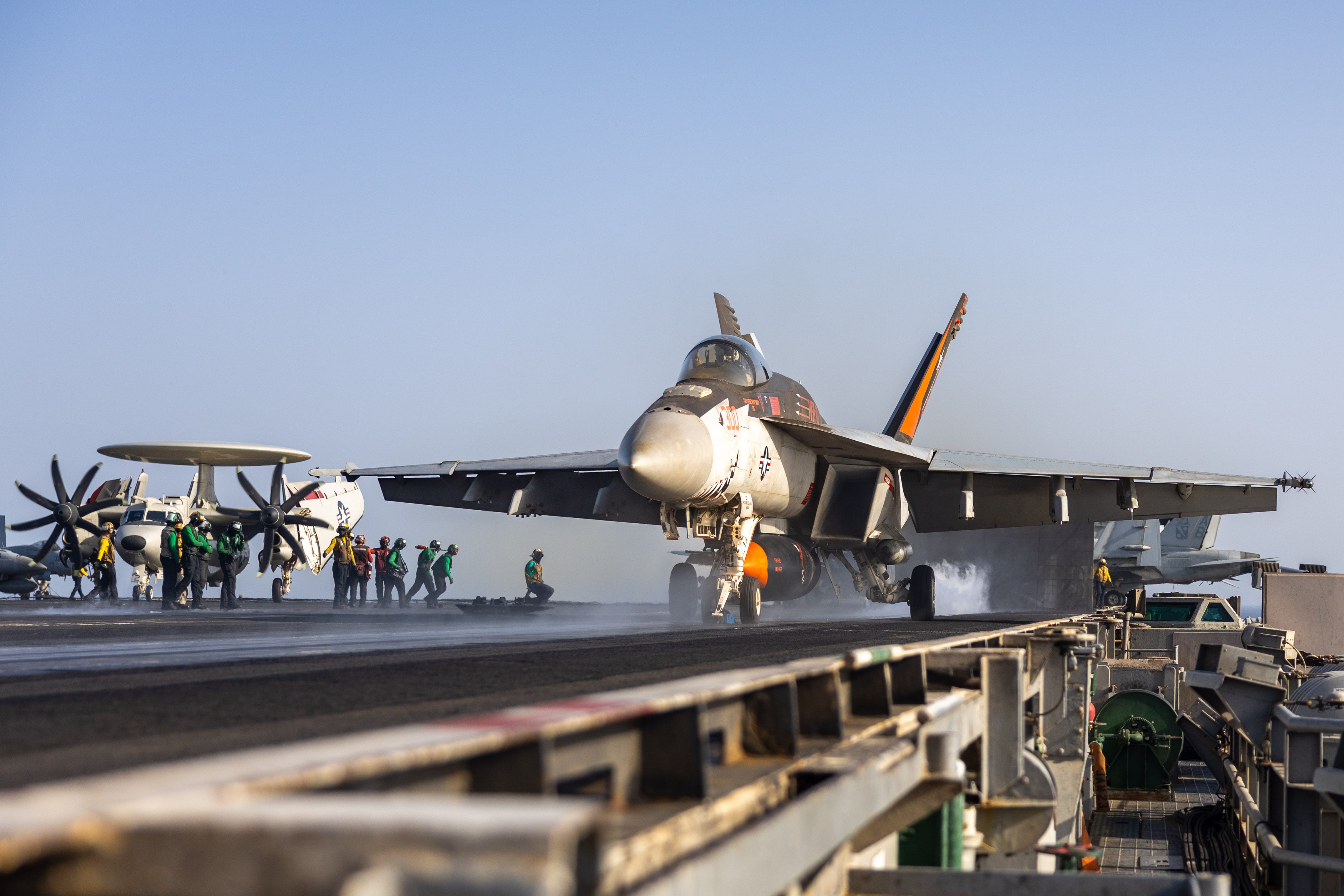 An F/A-18E Super Hornet, attached to Strike Fighter Squadron (VFA) 136, launches from the flight deck of the Nimitz-class aircraft carrier USS Harry S. Truman (CVN 75) during flight operations in the U.S. Central Command area of responsibility.