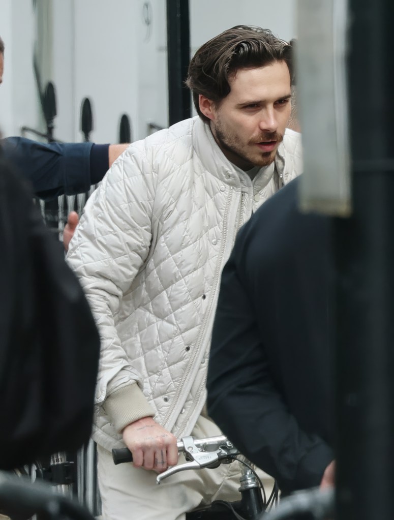 Brooklyn Beckham posing for a Moncler photo shoot in London May 19. 