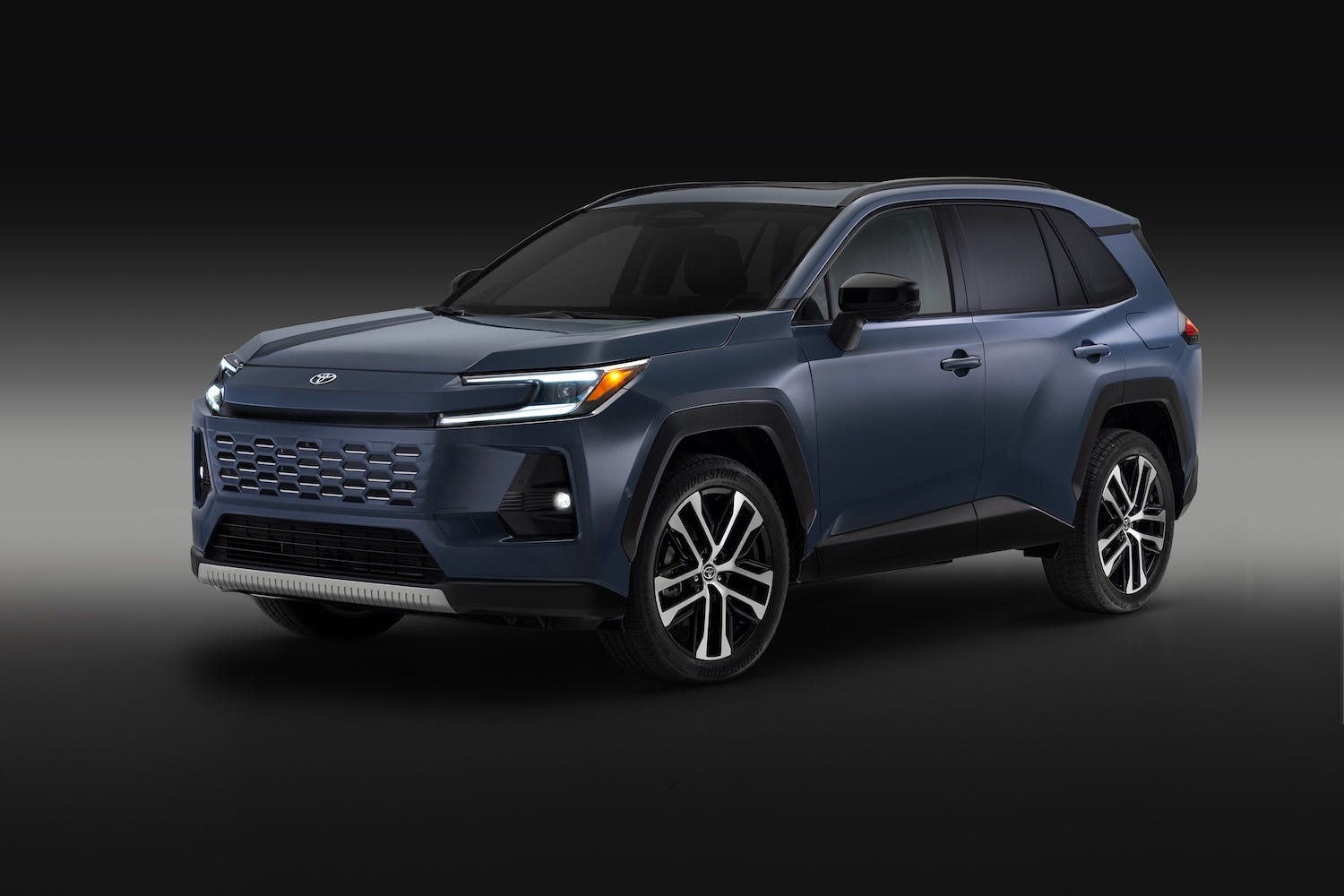 New Toyota RAV4 SUV in Blue pictured on black background