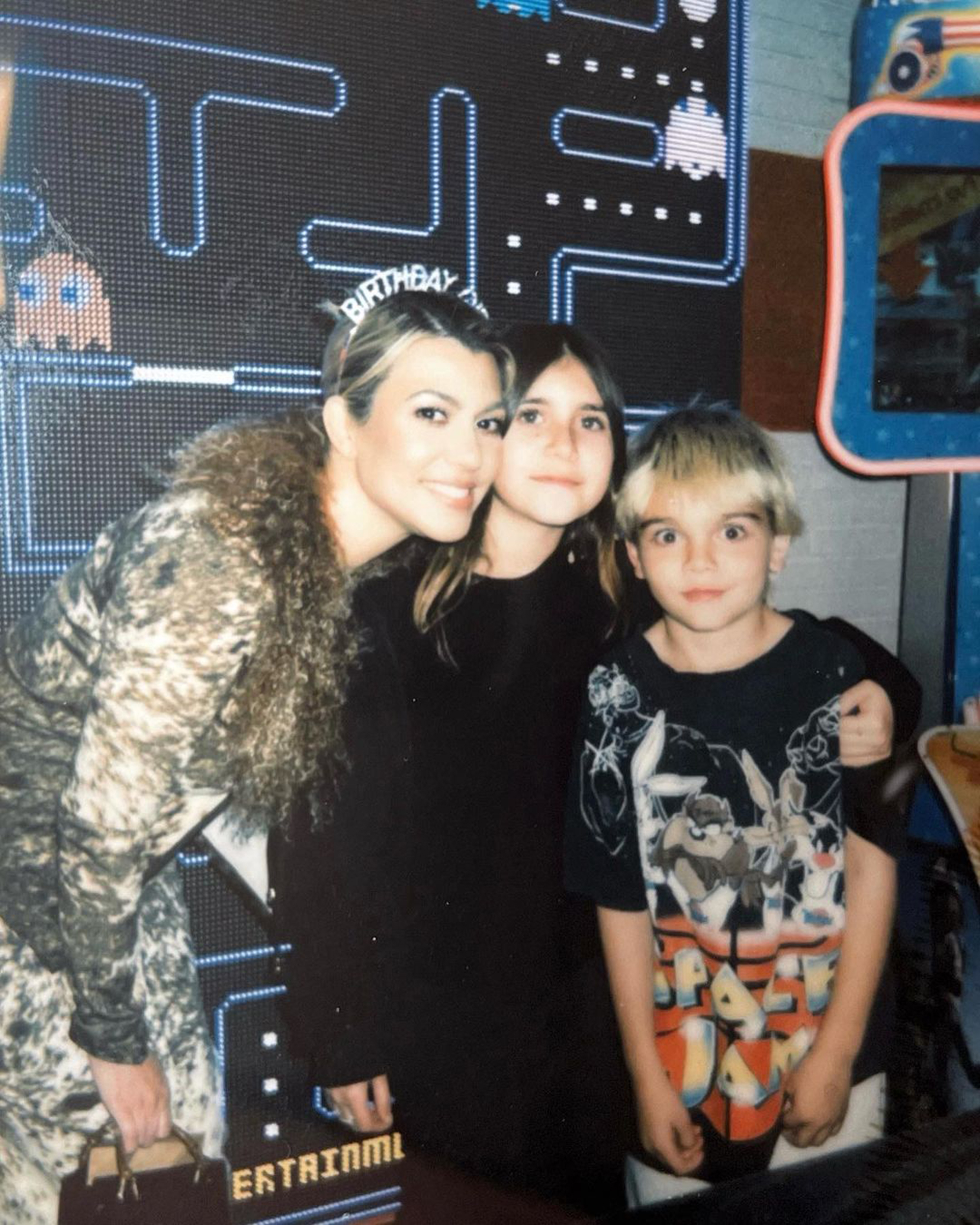 Kourtney Kardashian and two of her kids