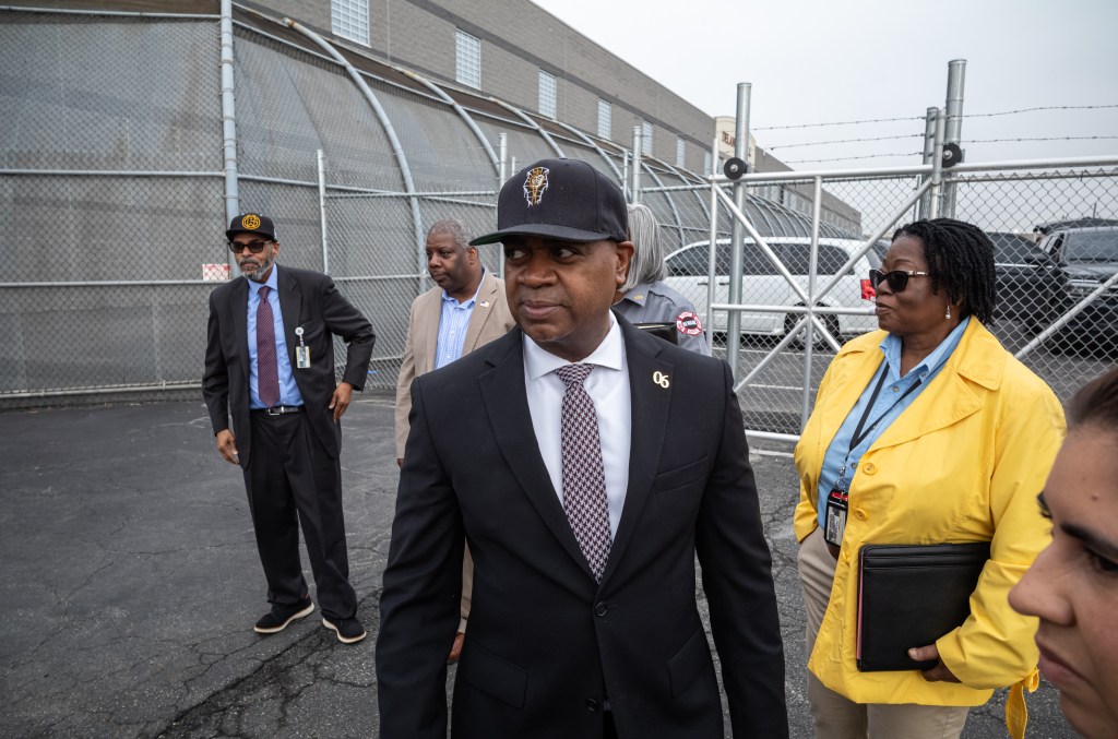 Newark Mayor Ras J. Baraka standing in front of Delaney Hall detention facility with city officials after being denied inspection access