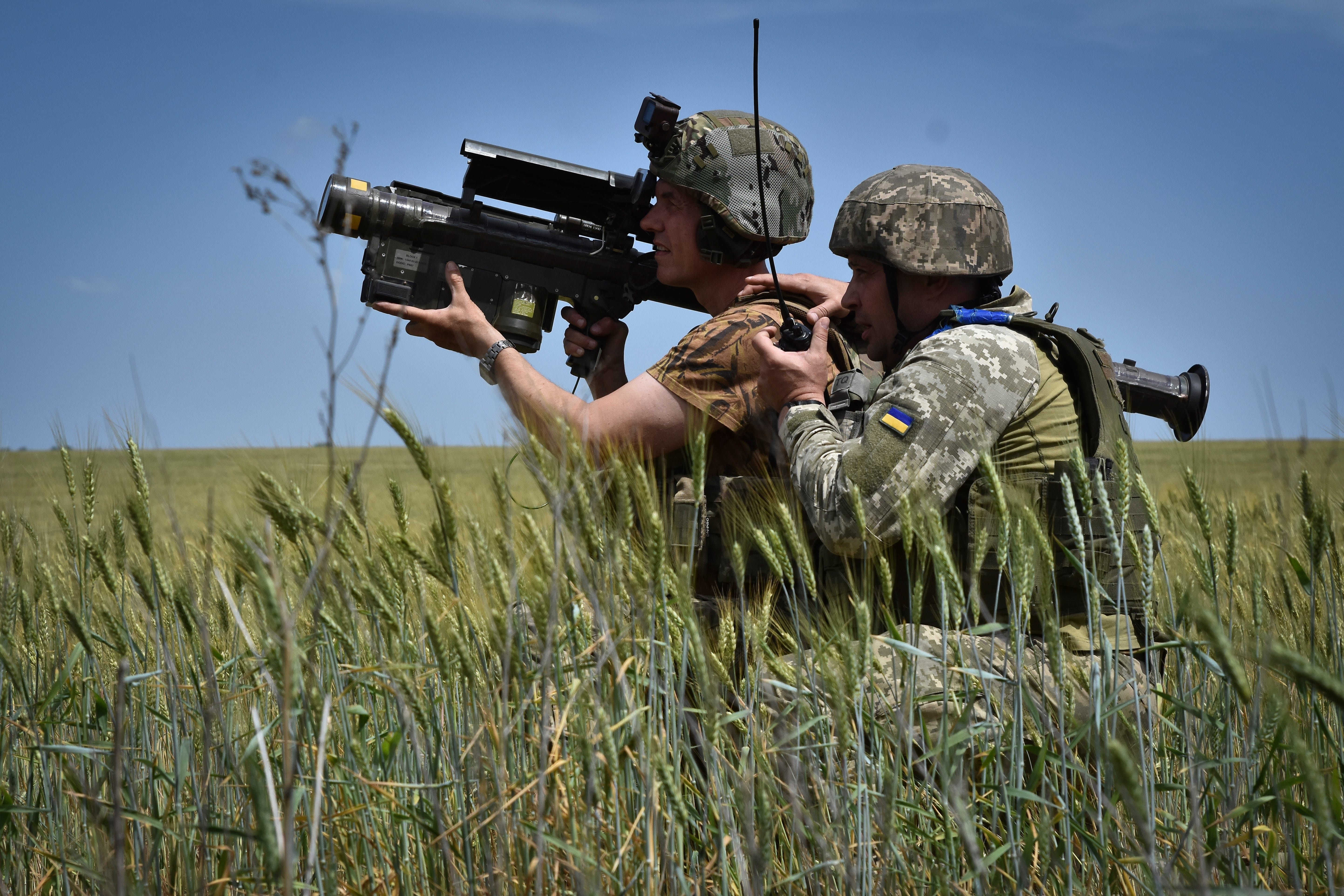 Ukrainian servicemen search for a target with an FIM-92 Stinger launcher on the front line in the Zaporizhzhia region in May 2024.