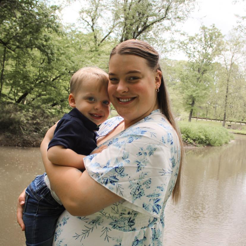 Tara Hollifield smiling with her son Parker, posted on Facebook May 1, 2025, after saving him from tornado rubble in Kentucky