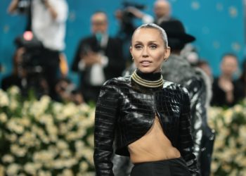 Miley Cyrus On Why She’s Releasing ‘Something Beautiful’ In Theaters & How Harrison Ford Advised Her Against Touring In The Forest