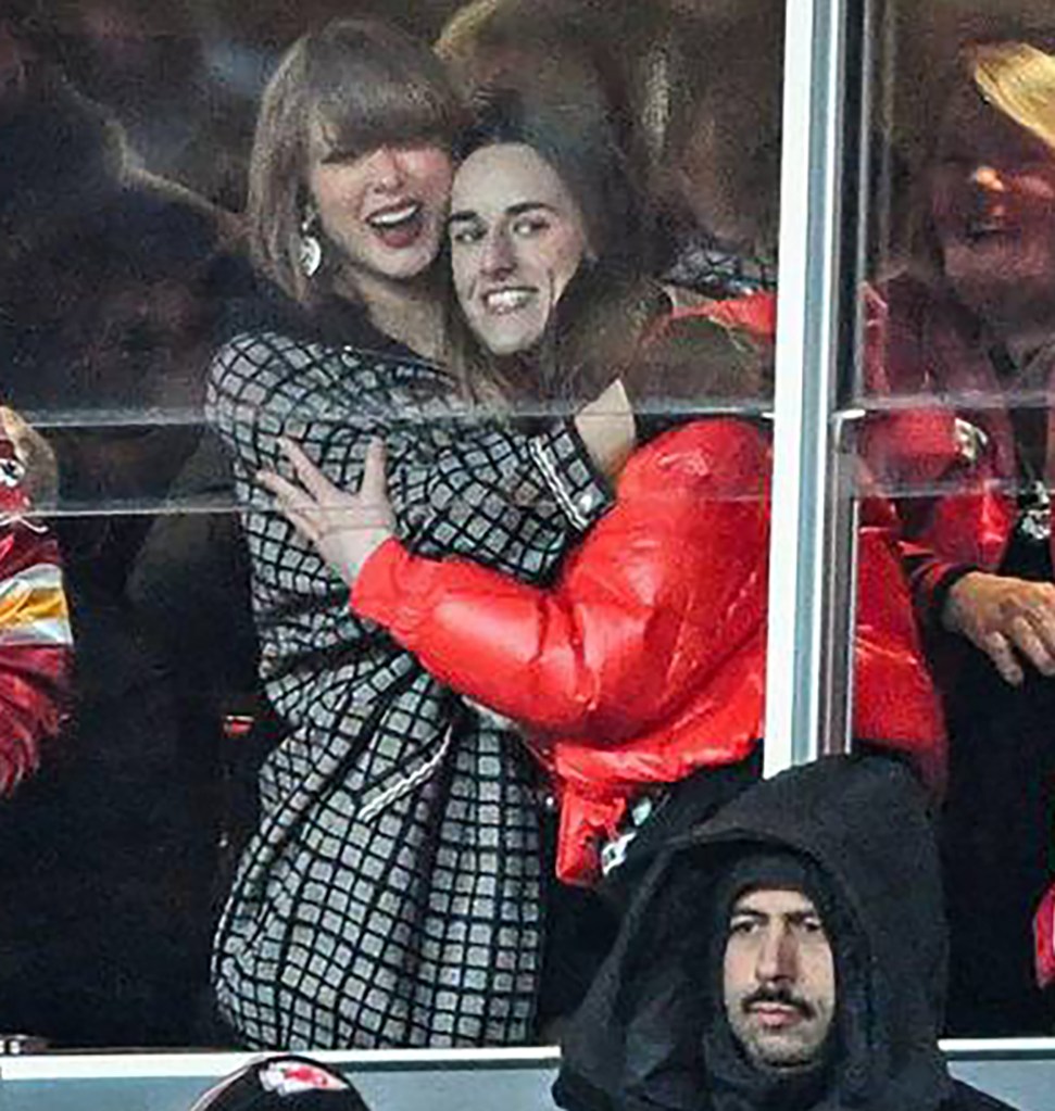 Taylor Swift and Caitlin Clark embrace after Kansas City Chiefs tight end Travis Kelce scored a touchdown in the fourth quarter against the Houston Texans during a AFC Divisional Round playoff game on Jan. 18, 2025, at GEHA Field at Arrowhead Stadium in Kansas City, Missouri.