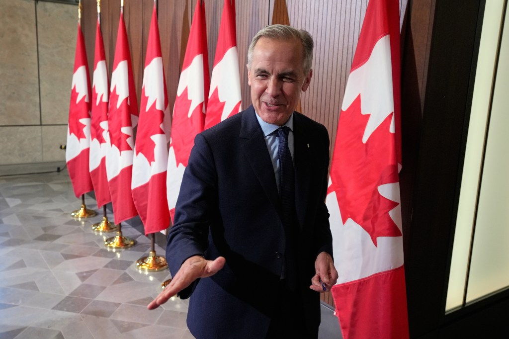 Canadian Prime Minister Mark Carney speaking at a news conference in Ottawa, Ontario, on May 21, 2025.